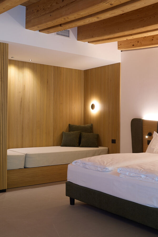 Hotel Lido sulle sponde del lago di Ledro HOTEL LIDO s.r.l. | Junior Suite con Giardino